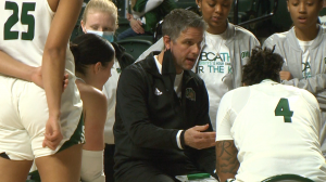 Ohio head coach Bob Boldon talks to his team during a timeout in the fourth quarter of their game against Western Michigan.