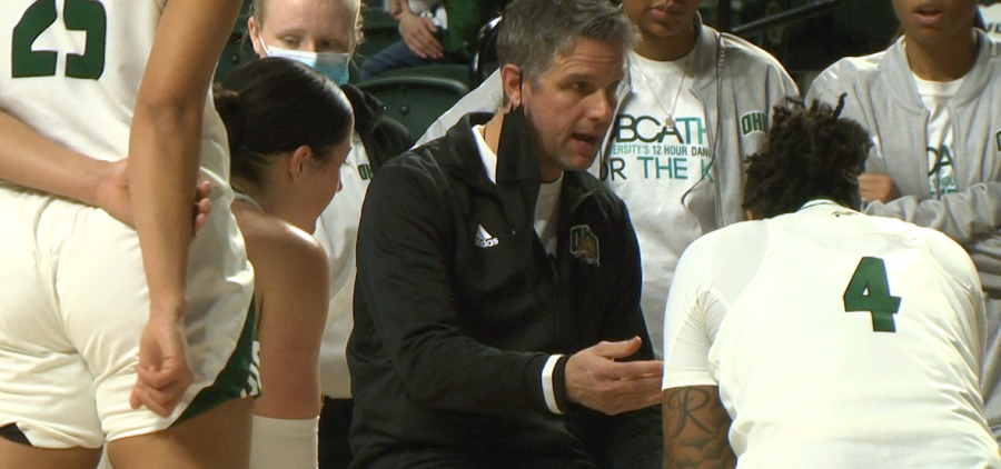 Ohio women's basketball head coach Bob Boldon talks to his team in a huddle in the fourth quarter of their game against Western Michigan.