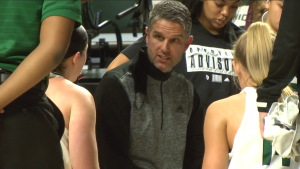 Ohio head coach Bob Boldon chats with his players prior to the start of the fourth quarter of the Bobcats' game against Eastern Michigan on Feb. 14, 2022.