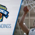 Hardwood Heroes Final Boys Standings. Player with towel around neck holds scissors to cut basketball net