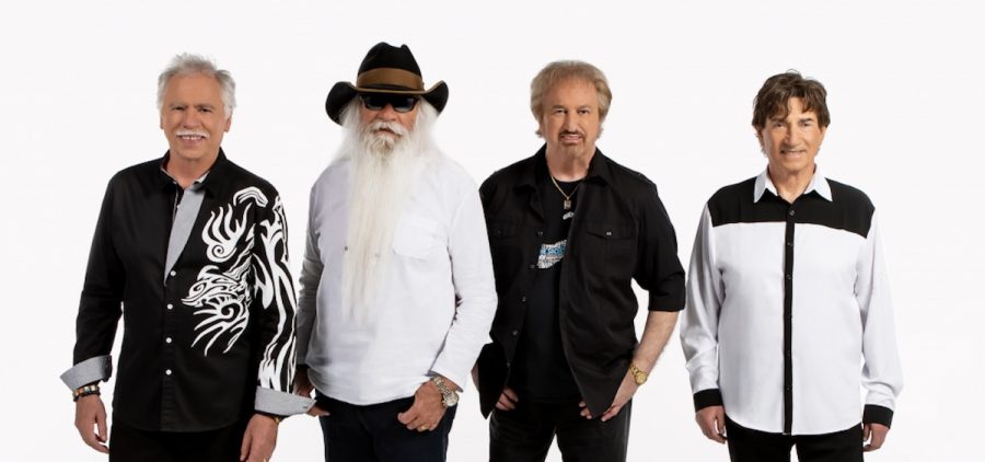 The Oak Ridge Boys pose against a white background for a promotional photo.