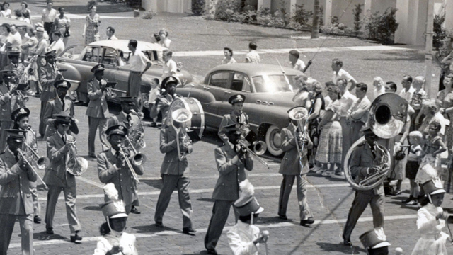 black marching band in parade circa 1950s