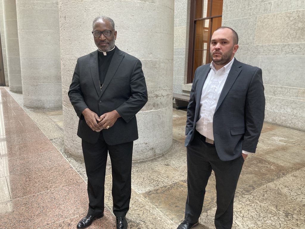 Pastor Derrick Anderson, Youngstown, and Americans for Prosperity State Director Donovan O'Neil stand in the hallway of the Statehouse