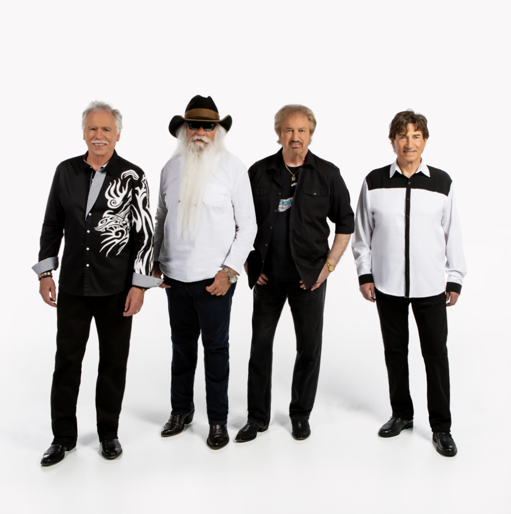 The Oak Ridge Boys pose against a white background for a promotional photo.