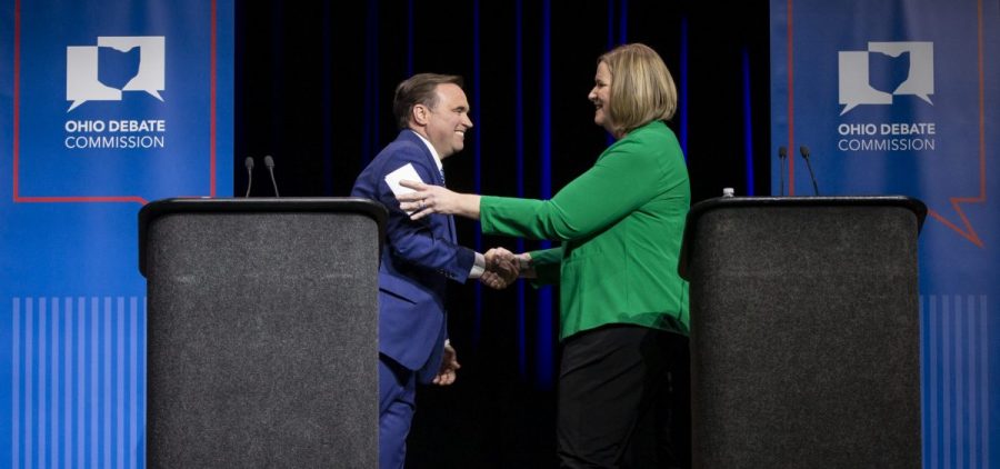 John Cranley, former mayor of Cincinnati, and Nan Whaley, former mayor of Dayton, shake hands after the Ohio Gubernatorial Democratic Primary Debate at the Paul Robeson Cultural & Performing Arts Center at Central State University in Wilberforce, Ohio