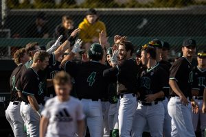 Ohio celebrates a homerun hit by Spencer Harbert (4) in the fifth inning of their game against Marshall on March 16, 2022. [Joseph Scheller | WOUB]