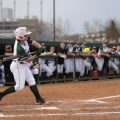Caitlin Fogue swings at the pitch during Ohio's game against Ohio State on Tuesday, March 22, 2022.