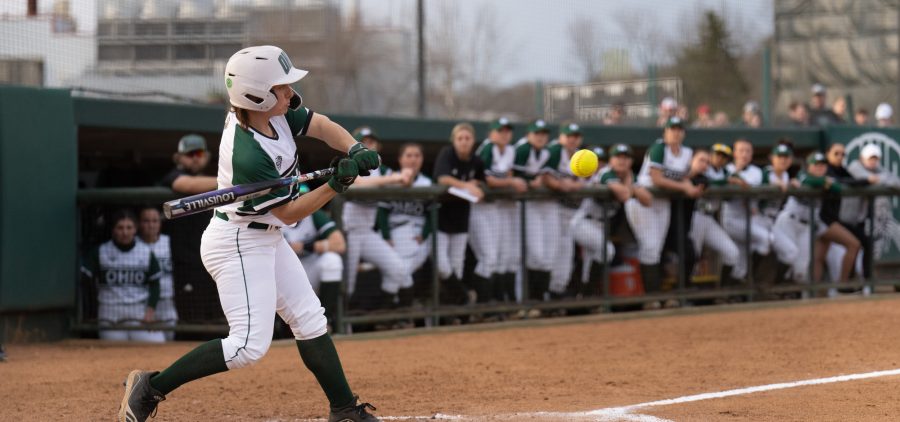 Caitlin Fogue swings at the pitch during Ohio's game against Ohio State on Tuesday, March 22, 2022.