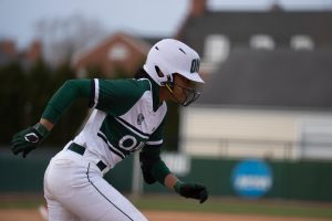Yasmine Logan runs towards first base after striking the ball during the Ohio University softball game against Ohio State University, in Athens, Ohio, on Tuesday, March 22, 2022. Ohio State University went on to win 6-1.