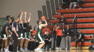 Ohio's Ben Vander Plas attempts a three from in front of the Bobcats' bench early in the second half of their game against Bowling Green.