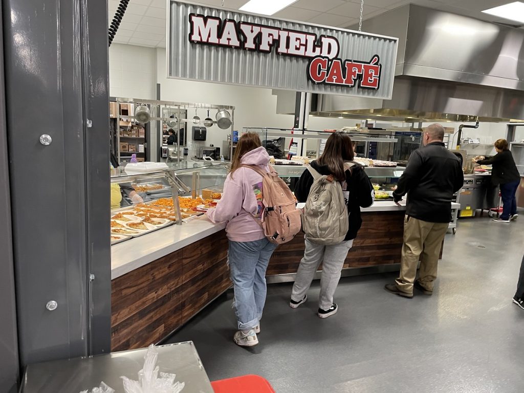 Students stand in line at the recently renovated cafeteria inside Mayfield High School.