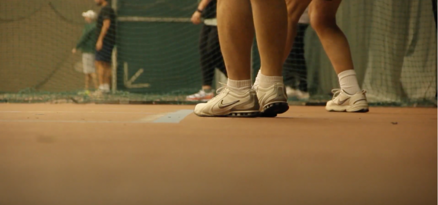 This photo shows the legs of pickleball players in the Ohio University Tennis Center Monday night.