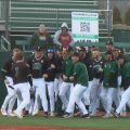 Ohio's AJ Rausch (7) celebrates with his teammates following a go-ahead homerun in the eighth inning of the Bobcats' game against Kent State on March 20, 2022.