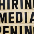 A hiring sign is posted outside a business in Huntingdon Valley, Pa.