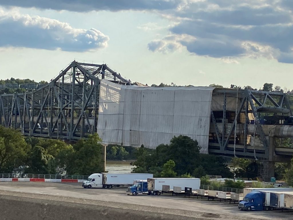 The Brent Spence Bridge, still under construction with a tarp over a portion of the bridge