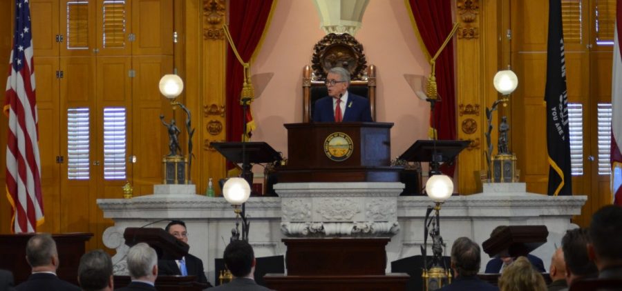 Gov. Mike DeWine (R-Ohio) delivers his State of the State address in the Ohio House chamber.
