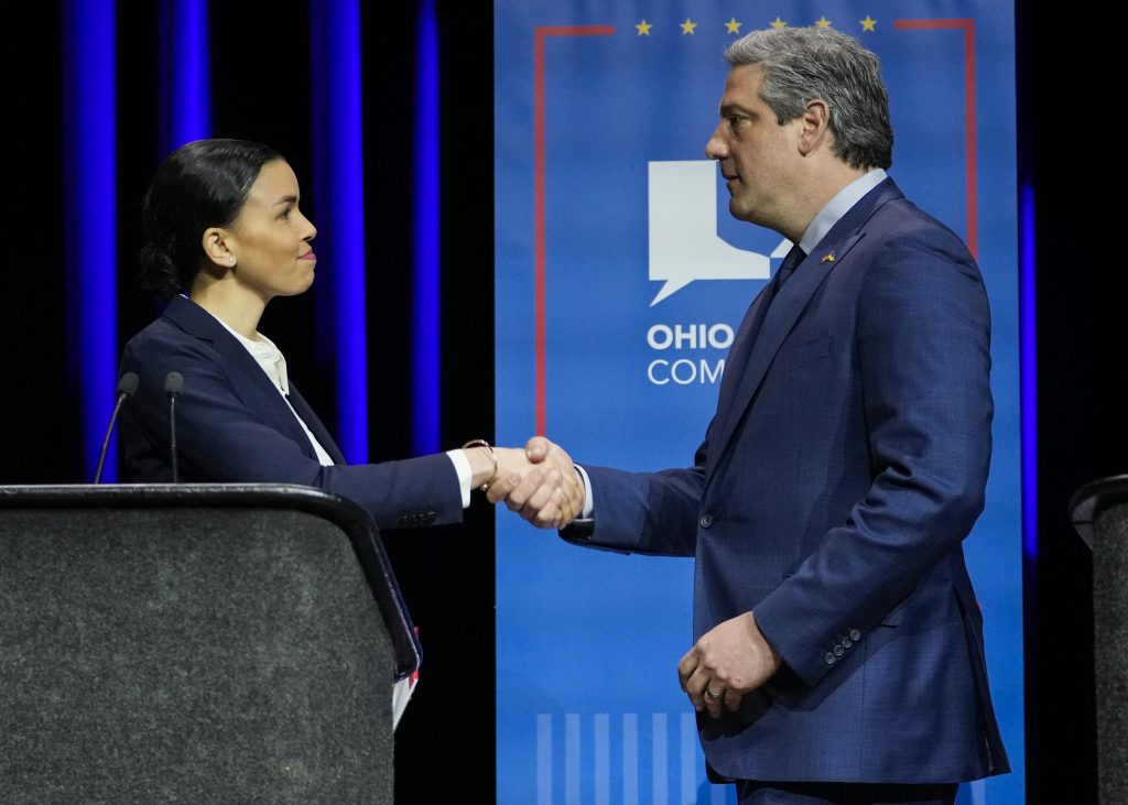 Morgan Harper and Rep. Tim Ryan shake hands at the end of the debate hosted by the Ohio Debate Commission. 