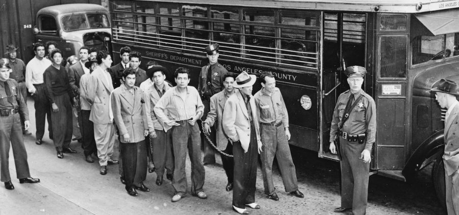 Zoot suiters lined up outside Los Angeles jail. June 9, 1943.