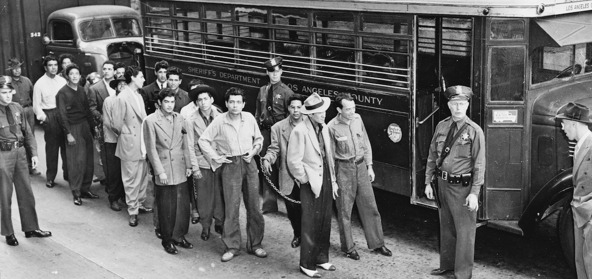 Zoot suiters lined up outside Los Angeles jail. June 9, 1943.