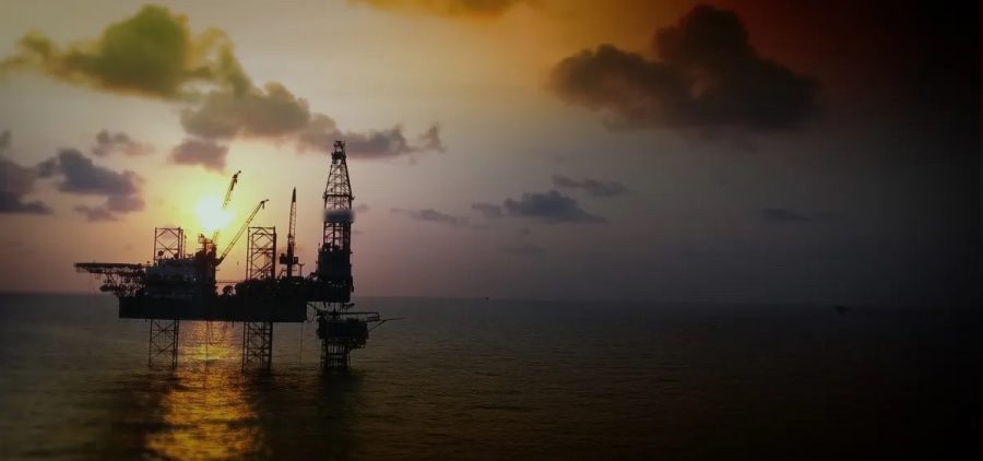 Ocean oil platform at sunset