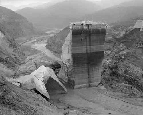View of the remaining center portion of the St. Francis Dam, visible after its disastrous collapse. 1928.