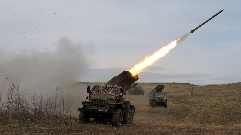 A Ukrainian multiple-rocket launcher fires shells toward Russian troops, near Lugansk, in the Donbas region.