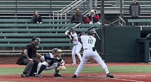 Ohio Baseball's Mason Minzey prepares to swing his bat, looking to get on base.