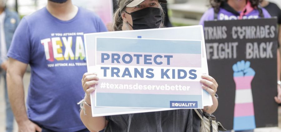 Protesters rally at the Texas State Capitol on May 4, 2021 in Austin to stop proposed medical care ban legislation that would criminalize gender-affirming care.