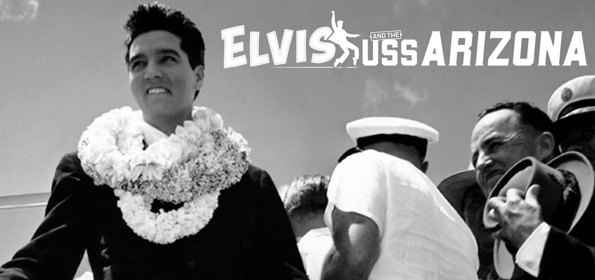 Elvis with a Hawaiin lea around neck