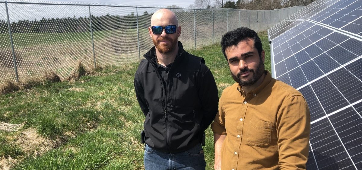 Adam Farkes and Leo Azevedo of BNRG at a solar energy project in Augusta, Maine.