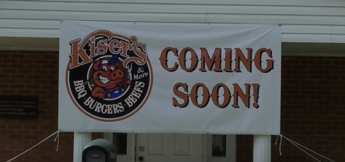 A coming soon sign outside of the new Kaiser's Barbecue location on East State Street