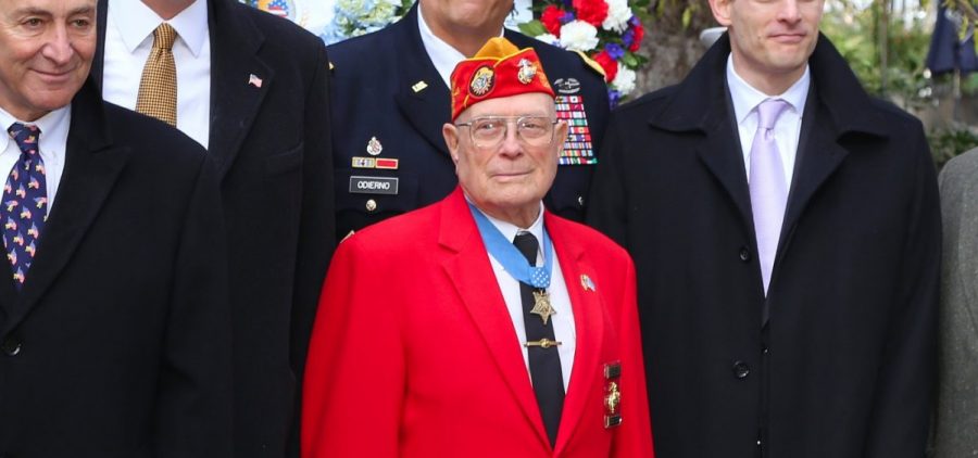 Woody Williams poses for a group picture at a Veteran's Day ceremony in 2013