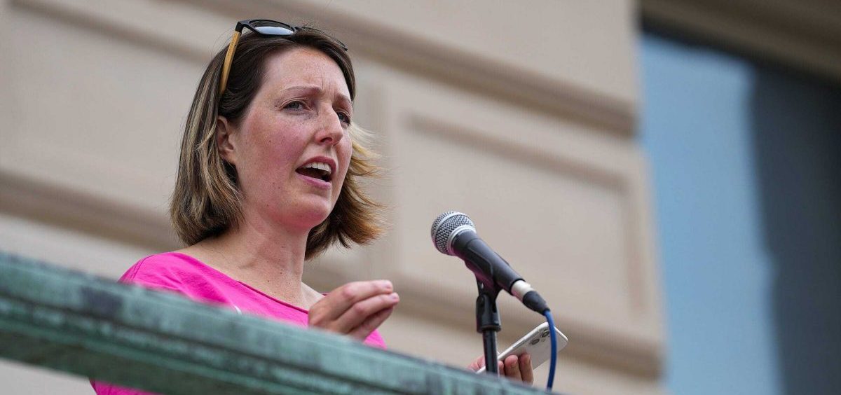 Dr. Caitlin Bernard, the Indiana doctor who provided an abortion to a 10-year-old rape victim from Ohio, speaks during an abortion rights rally in June at the Indiana Statehouse.