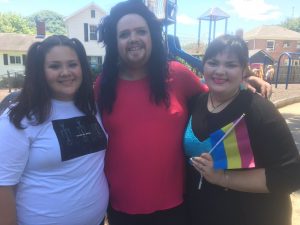 Three people at a Pride event