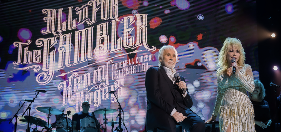 Kenny Rogers and Dolly Parton onstage with program title