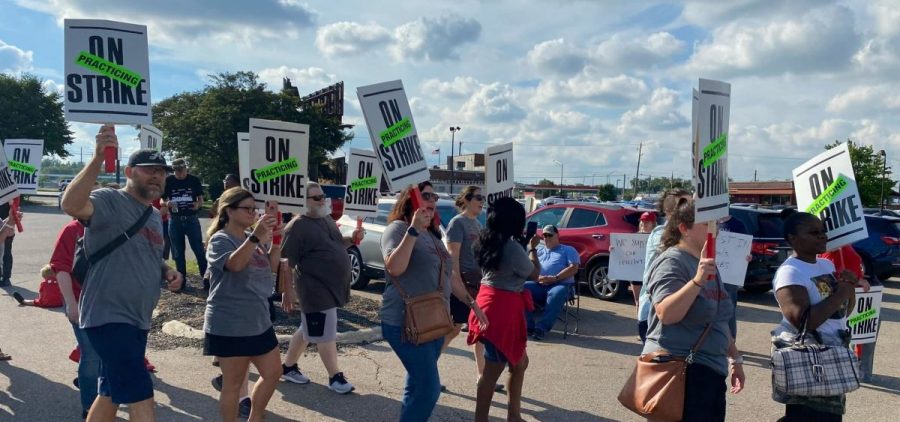 Members of the Columbus Education Association rally earlier this summer ahead of their vote this past Sunday night to officially strike this week.