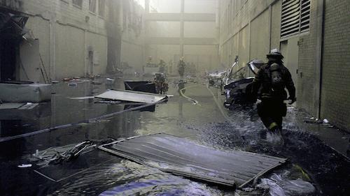 firefighters inside the pentagon during 9/11. Debris and water cover floor surface