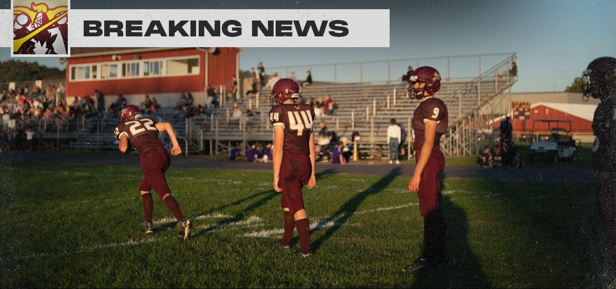Federal Hocking logo with text "BREAKING NEWS." Football players run in a line in front of bleachers at Federal Hocking football field