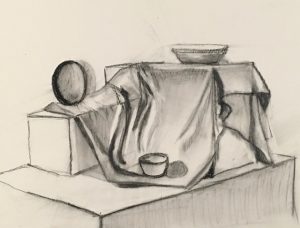 A black and white graphite drawing of a round fruit, a small cup, and a small bowl on top of a piece of softly folding fabric.