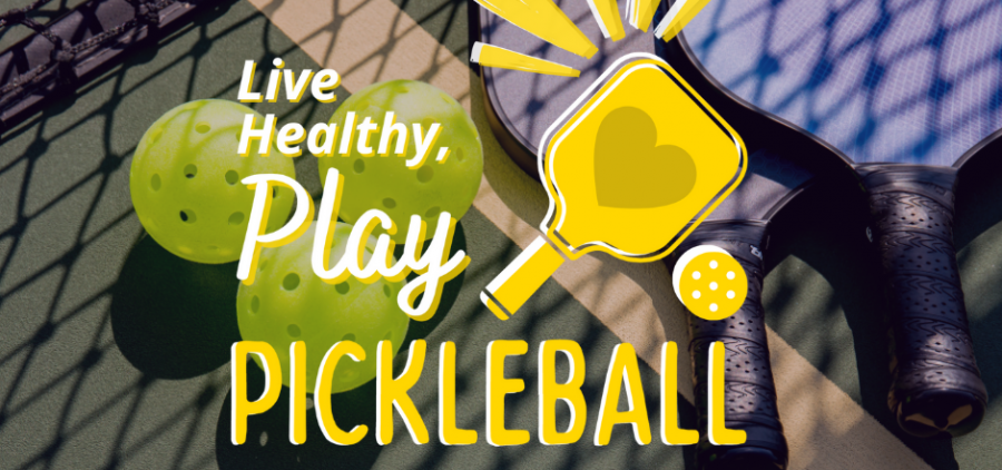 An image of a wiffle ball artfully laid against some kind of athletic floor with text overlaid that reads "live healthy play pickleball"