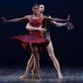 man and woman ballet dancers on stage in pose