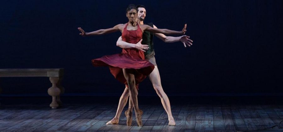 man and woman ballet dancers on stage in pose