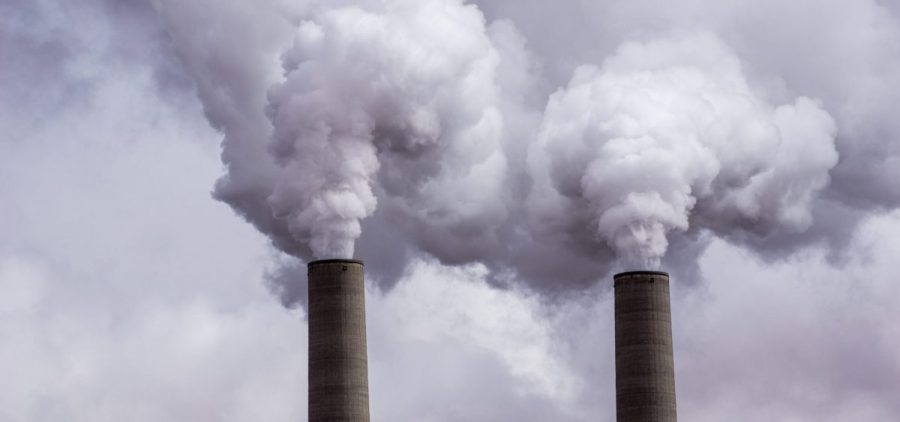 A power plant's smoke stack emit emissions