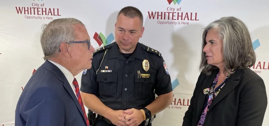 Gov. Mike DeWine (left) talks with Whitehall Police Chief Mike Crispen and Whitehall Mayor Kim Maggard after the event announcing the ARPA funds going to the Violent Crime Reduction Grant program.