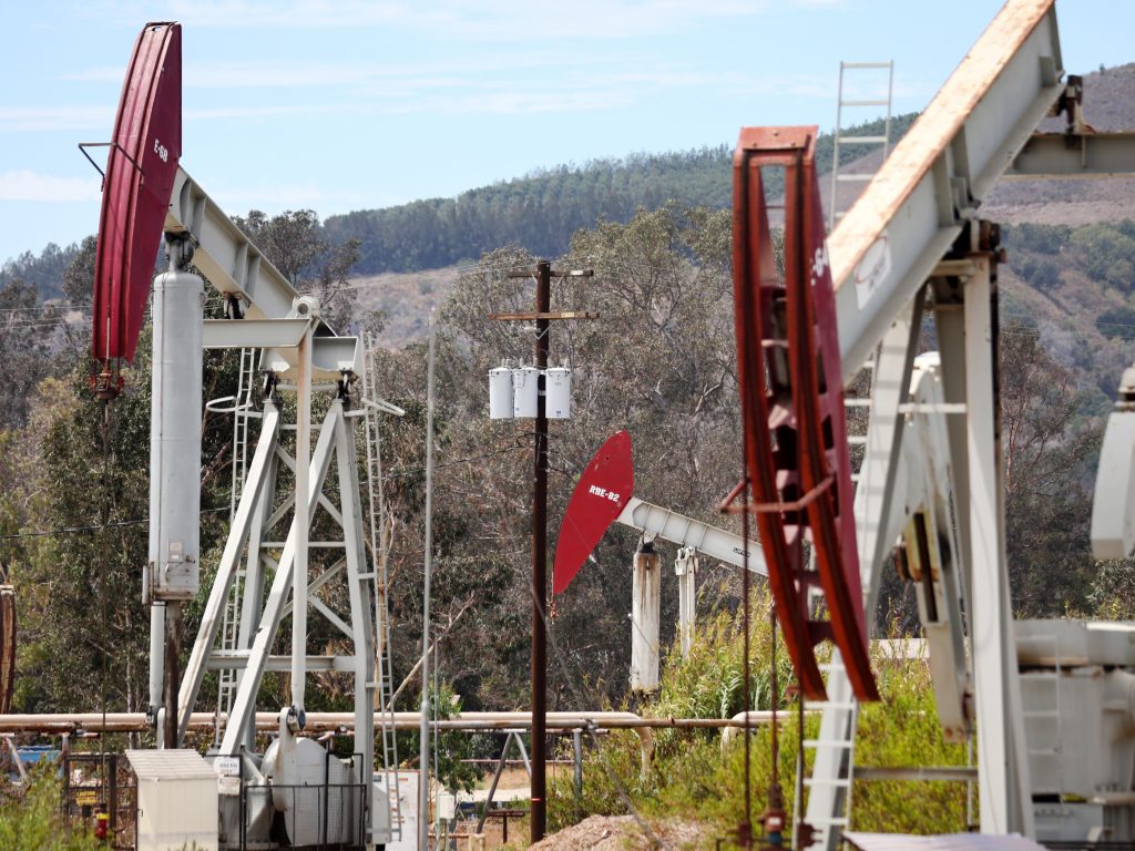 Oil pumpjacks operate near Ventura, Calif., on Aug. 5.