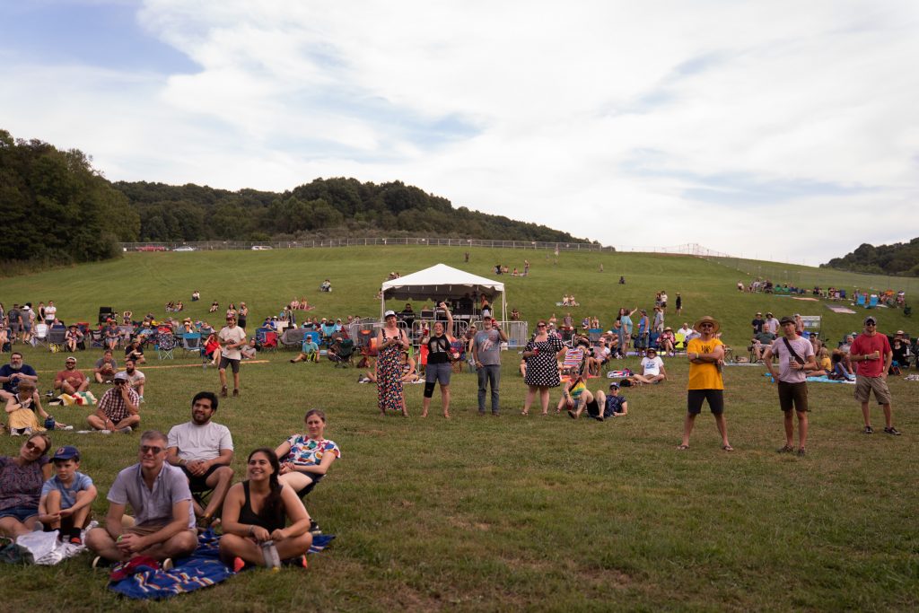 People watch as Blue Cactus plays at Nelsonville Music Festival’s Snow Fork Stage.