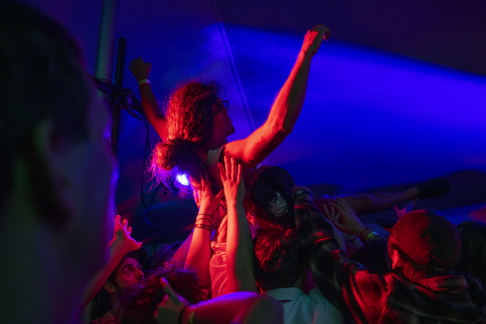 Audience members crowd surf at the after hours DANA performance at the Campground Stage at the Nelsonville Music Festival on Saturday, Sept. 3rd, 2022, in Nelsonville, Ohio.