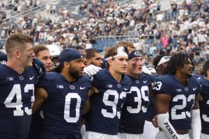 Penn State celebrates its 46-10 victory by lining up together on the field at Beaver Stadium