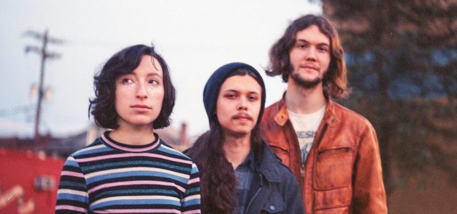 A promotional picture for the band no stars. All three members are standing outside.