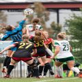 Isabella Ginocchi (6) battles for the header against the VMI keeper in Athens, Ohio, on Sunday, Sept. 4, 2022. [Alex Eicher | WOUB]